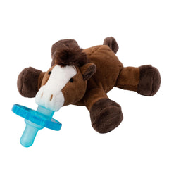 WubbaNub Horse in hands shows comforting plush partner during soothing routines.
