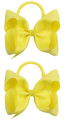 Xansema headbands in yellow 6in close-up, great for newborn photos.