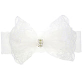 Xansema lace headband closeup with elastic fit for newborn comfort.