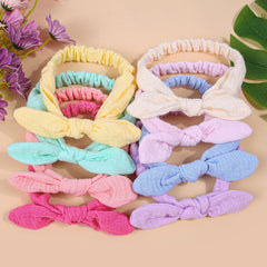 XIMA pastel lilac rabbit ears headband on a soft toddler look