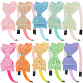 XIMA Bows Headbands 3.5 inch glitter bow closeup for sparkling party looks.