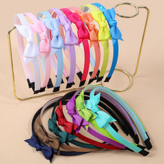 XIMA mini hair bows headband with teeth keeps hair in place.