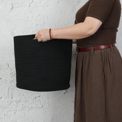 XUANGUO rope basket with hidden handles for easy transport.