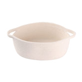 XUANGUO small woven basket with handle in white for nursery storage and tidy spaces.