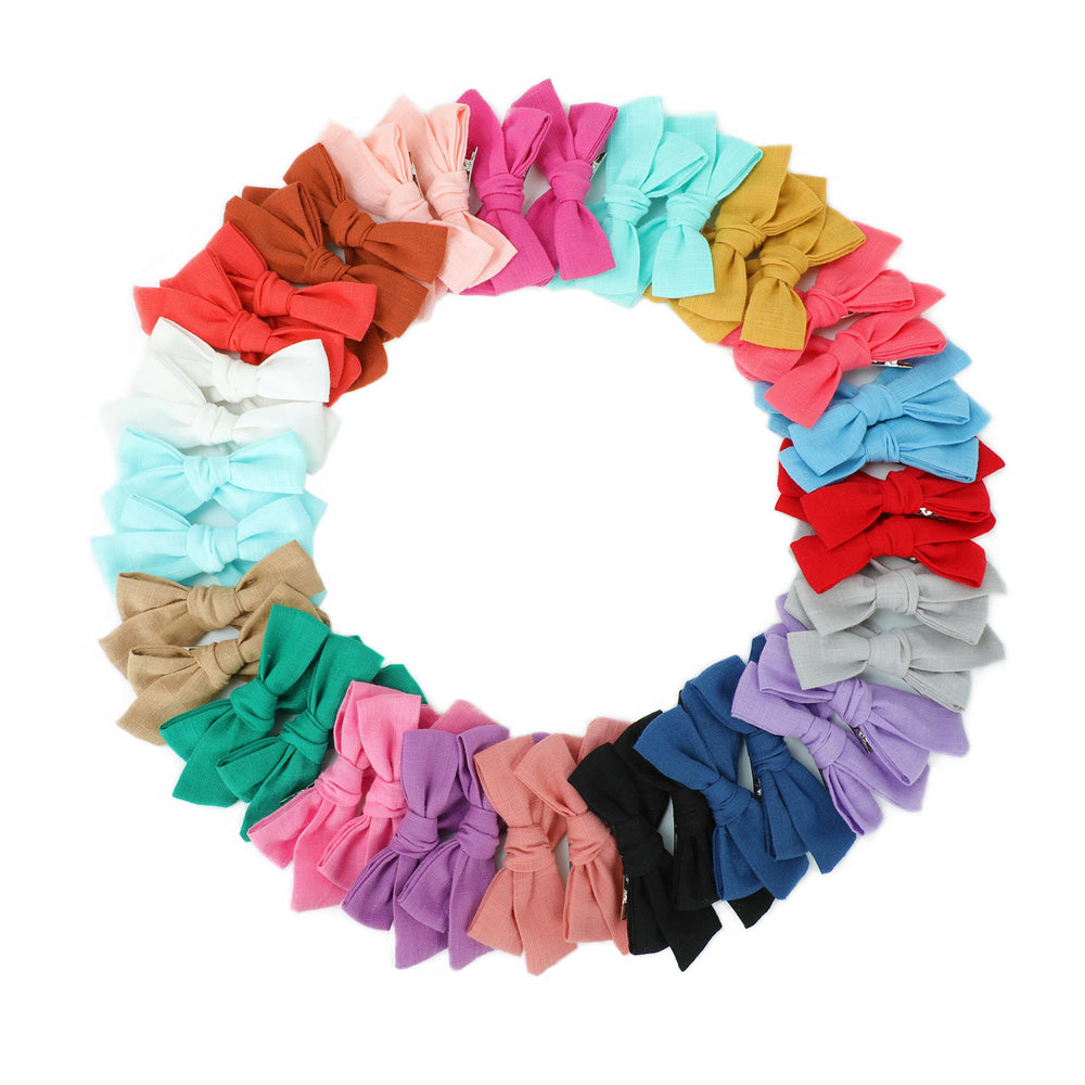 Xuxisowo linen hair bows close-up highlighting breathable fabric for everyday wear