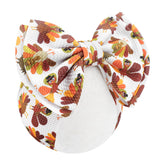 YanJie 7-Inch headband on baby with festive turkey bow for holiday outfits
