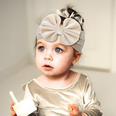 YanJie leopard velvet bow headband adds cute flair with secure design