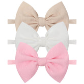 YanJie knotted bows light pink headband for easy everyday outfits.