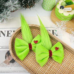 YanJie Christmas hair bow with heart rhinestone detail adds festive charm for photo-ready holiday looks.