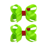 YanJie Christmas hair clip with Grinch-green bow and heart detail for festive photos