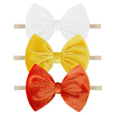 YanJie Halloween velvet headband orange bow, soft fit for babies.