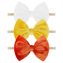 YanJie Halloween velvet headband orange bow, soft fit for babies.