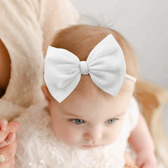YanJie handmade velvet bow close up showing knotting craftsmanship