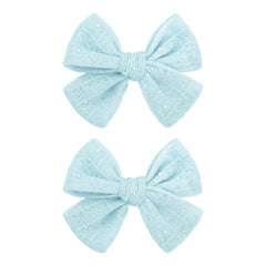 YanJie lace bow clip in light blue adds subtle sparkle to daily hairstyles.