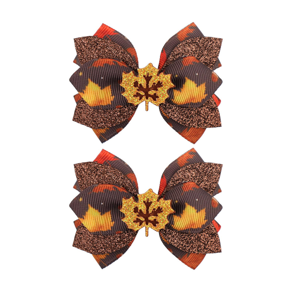 Yanjie maple glitter leaf bow clip adds shimmering fall detail.