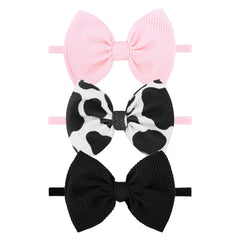 YanJie Moo Cow Print Bow Headband adds cute style for baby's daily outfits.