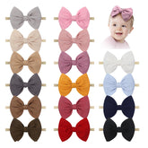 YanJie nylon headbands in green with a handcrafted bow for gentle everyday wear.