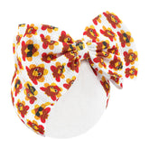 Yanjie turkey-printed headband enhances festive Thanksgiving look.