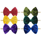 YanJie Velvet Baby Bow Headband closeup showing soft texture and delicate knot for newborn styling.