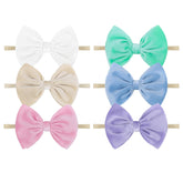 YanJie velvet baby headband with soft bow for newborns and everyday photoshoots.