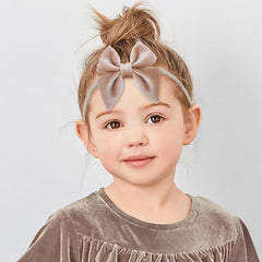 YanJie velvet bow headband in beige with closeup of soft nylon material