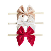 YanJie velvet bow headband in red on infant with soft stretched nylon for daily wear