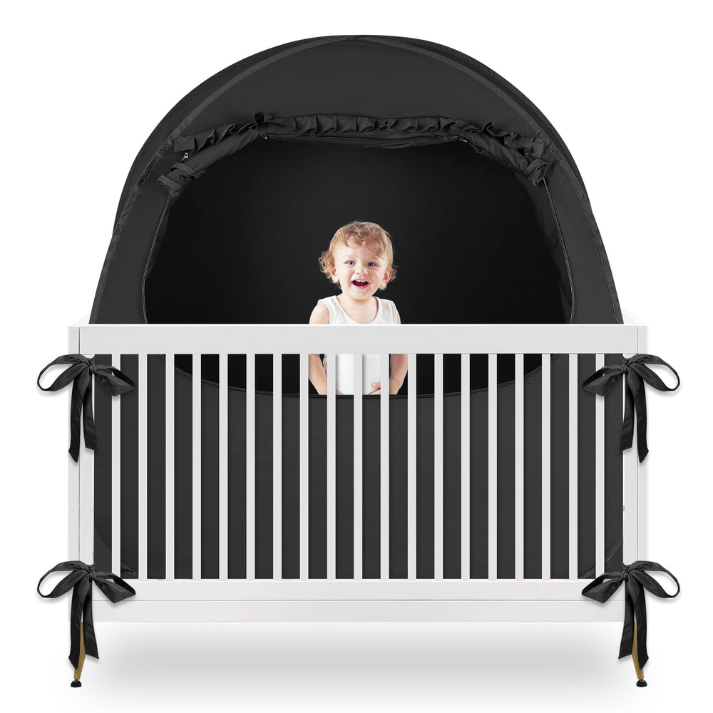 YAVIL blackout baby sleep tent open in crib for daytime naps
