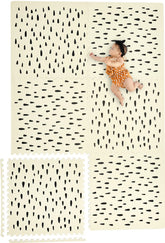 Yay Mats stylish play mat tiles assembled form a large safe tummy-time area.