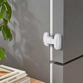 YCTMALL fridge door lock close-up shows the button for easy adult operation and child safety.