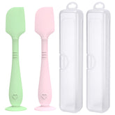 YENLNI diaper cream spatula in green with suction base for hands-free use.