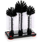 Yesland water-bottle-cleaning-brush with suction base secured to sink, ready for efficient cleaning.