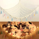 Yewiwin stuffed-animal-hammock light-beige corner view for space-saving toy storage.