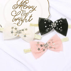 Yheahin bow detail with crystal accents—adds charm to outfits.