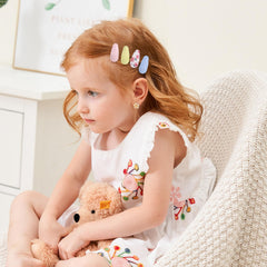YHXX YLEN 1.5-inch wrapped mini barrettes provide secure hold for fine hair.