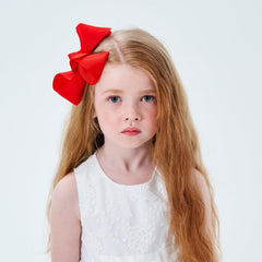 YHXX YLEN red bow clips on-model, secure hair with a neat, ready-for-school look.