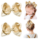 YHXX YLEN light gold bow clip, 4.5 inches, for quick toddler ponytails.