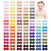 YHXX YLEN mini baby hair bows close-up on 1.2 inch clip with gentle grip for delicate hair