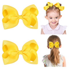 YHXX YLEN yellow hair bows on clips side view for everyday wear.