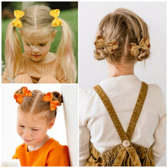 YHXX YLEN 3-inch toddler bows on clips shown on a girl