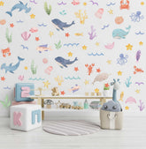 YIMEHDAN ocean wall decals with whales and dolphins for a calming baby bedroom ambiance.
