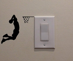 YINGKAI two-handed dunk light-switch decal on wall adds dynamic sport flair for kids' rooms.