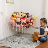 YKBU stuffed animals hammock corner display keeps plush toys neatly organized in a corner.