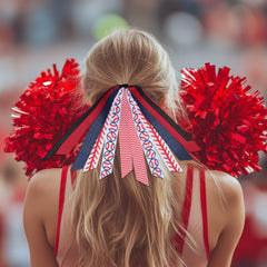 YKW navy bat-pattern hair tie adds coordinated athletic look on field