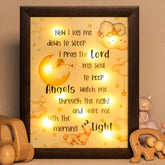 YLOVAN baptism night-light frame in brown provides a gentle glow for bedtime.