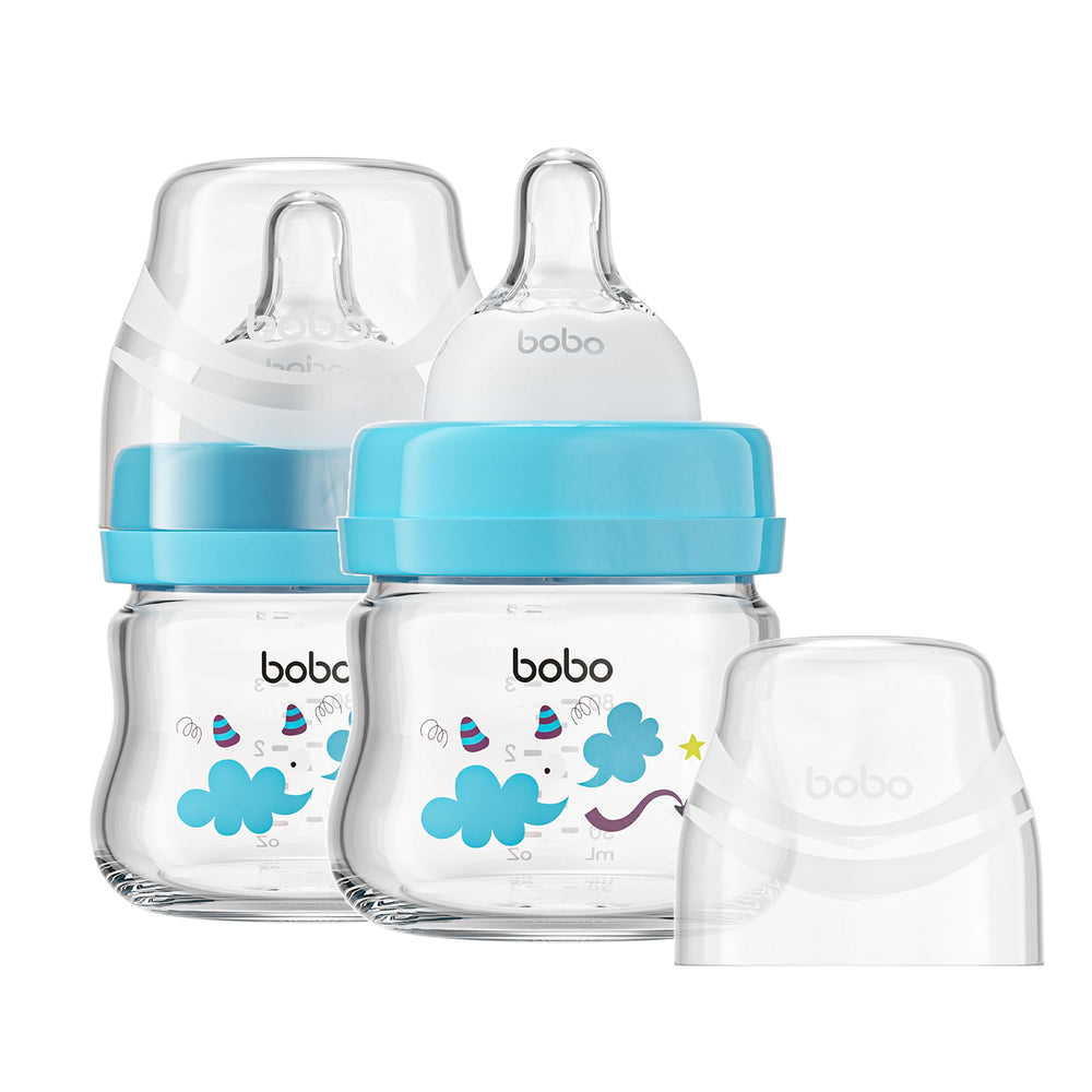YOHKOH glass baby bottle closeup showing slow-flow nipple for newborn feeding