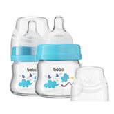 YOHKOH glass baby bottle closeup showing slow-flow nipple for newborn feeding