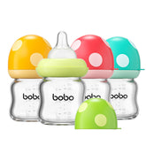 YOHKOH natural glass baby bottle wide neck mushroom pattern enhances feeding comfort and easy cleaning.