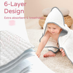 Yoofoss baby towel used as swaddle or blanket for cozy post-bath cuddle.