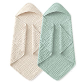 Yoofoss hooded baby towel folded in apricot-green, soft muslin ready for newborn bath