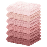 Yoofoss muslin baby washcloths folded in gradient pink for gentle cleansing